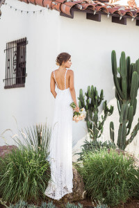 bohemian-bride-wearing-backless-amber-lace-dress-at-casino-san-clemente