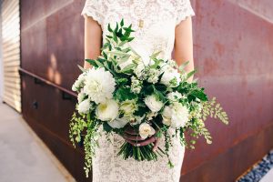 rustic-wildflower-green-wedding-bouquet-at-LA-venue-smog-shoppe