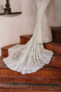 detailed-shot-of-alice-bohemian-backless-gown-against-tiled-stairs-rustic-beauty