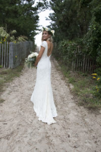 simple-wedding-dresses-inso-bride-wearing-ivoryy-lace-dress-with-low-back-and-short-train