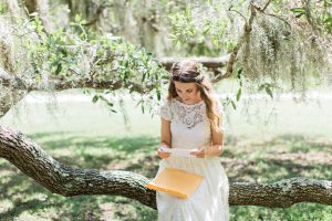boho-bliss-Florida-wedding-boho-bride-reading-a-love-letter