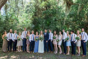 Florida-bohemian-wedding-bridal-party-and-bridesmaids-wearing-mismatched-boho-bridesmaids-dresses