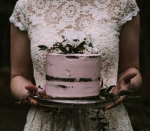 pink-naked-cake-photographed-by-sam-landreth-for-a-simple-and-bohemian-wedding-inspiration-shoot