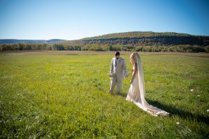 diy-laidback-bohemian-wedding-at-a-barn-in-new-york-bride-wore-a-backless-lace-boho-wedding-dress