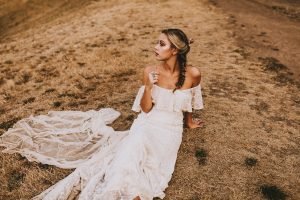 bohemian-off-shoulder-lace-wedding-dress-shown-here-in-ivory