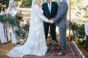 the-exchanging-of-the-vows-altar-finished-with-bohemian-rugs