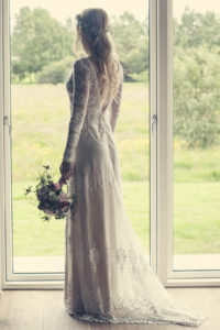 bride-helga-marries-in-iceland-wearing-dreamers-and-lovers-long-sleeve-aurora-gown-lace
