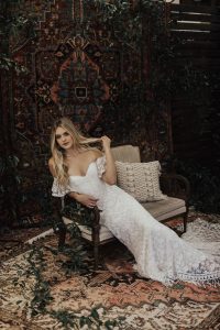 Callista-off-shoulder-wedding-dress-flutter-sleeves-center-row-of-butond-fitted-silhouette-and-long-train