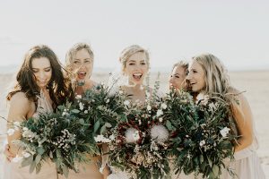 happy-bride-and-bridesmaids-palm-springs-pop-up-wedding-and-oversided-bouquets