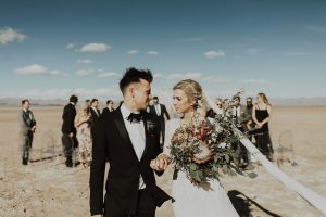 the-bride-and-groom-with-an-oversized-boho-bouquet-king-protea