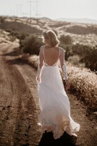 Jane-silk-and-cotton-mesh-lace-romantic-flowy-wedding-dress-long-appliqued-sleeves-open-back-and-elegant-train