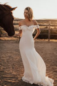 Poppy-off-the-shoulder-crepe-simple-bohemian-wedding-dress-fitted-silhouette-and-elegant-train