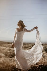Violetta-unique-lace-wedding-dress-with-open-back-and-fitted-long-sleeves