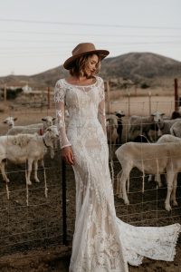 Fall-in-love-with-the-NEW-Willow-lace-wedding-dress-with-long-sleeves-cutout-open-back-and-long-train
