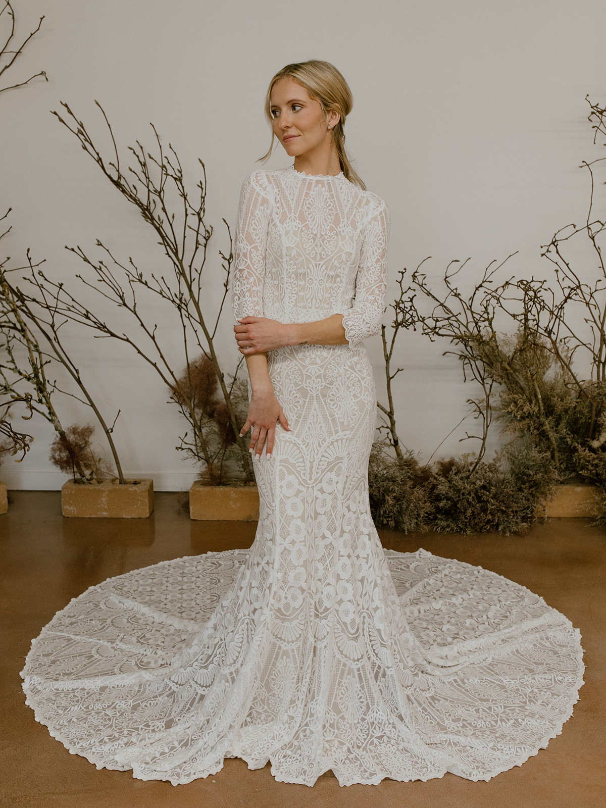 Timeless Long Sleeve Lace Wedding Dress with Plunging Neckline