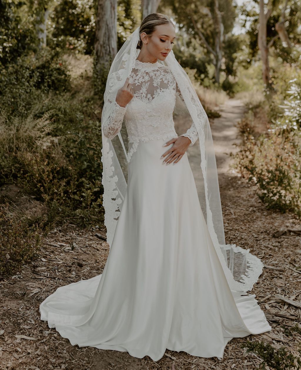 https://www.dreamersandlovers.com/wp-content/uploads/2023/09/Lotus-High-End-Boho-Wedding-Dress-Silk-and-Lace.jpeg