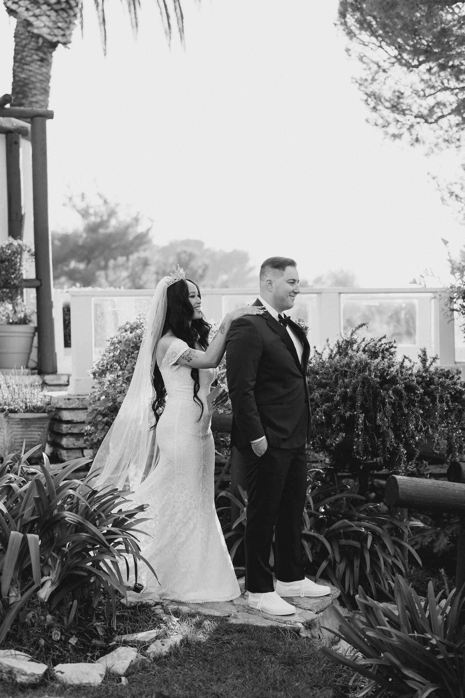 Bride-at-La-Venta-Inn-Palos-Verdes-California-Wedding-Venue-wearing-Dreamers-and-Lovers-dress