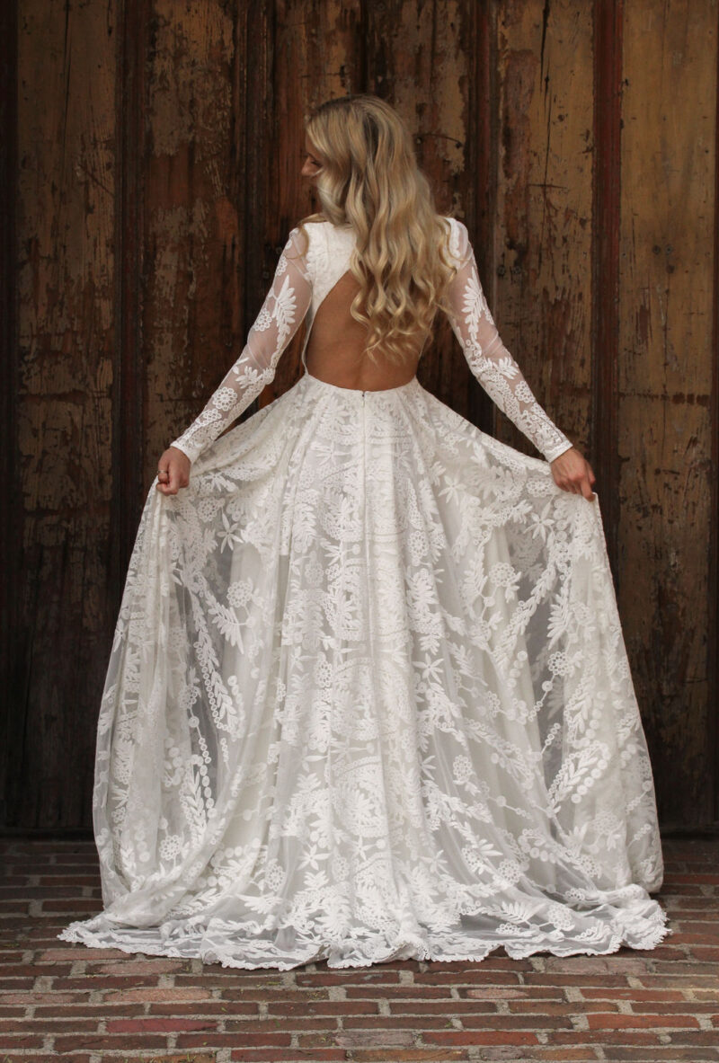 shop-the-River-lace-wedding-dress-with-flowy-skirt-and-pockets